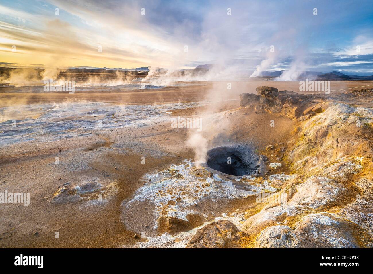 steaming mud holes and solfataras in the geothermal area of Hverir near lake Myvatn, northern Iceland Stock Photo