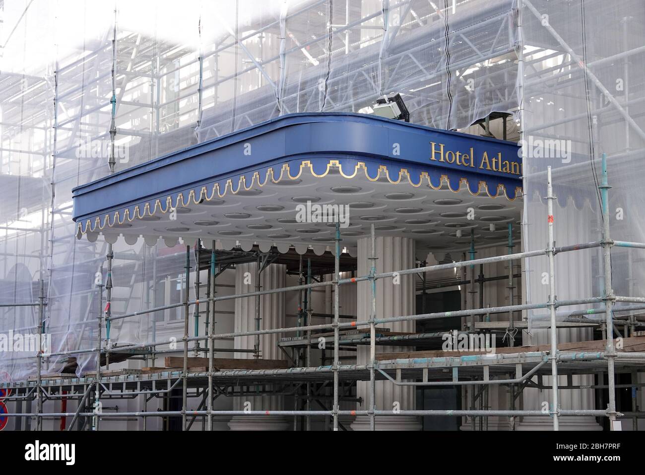 Hamburg, Germany. 22nd Apr, 2020. The closed Hotel Atlantic Kempinski, one of Hamburg's leading hotels, is currently being scaffolded due to construction work. The hotels of the Hanseatic city are closed for tourist operations due to the Corona crisis. Credit: Bodo Marks/dpa/Alamy Live News Stock Photo