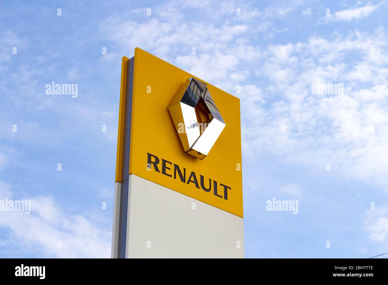Veliky Novgorod, Russia - August 23, 2019: Sign of a car dealership of the French manufacturer Renault against a summer day. Stock Photo