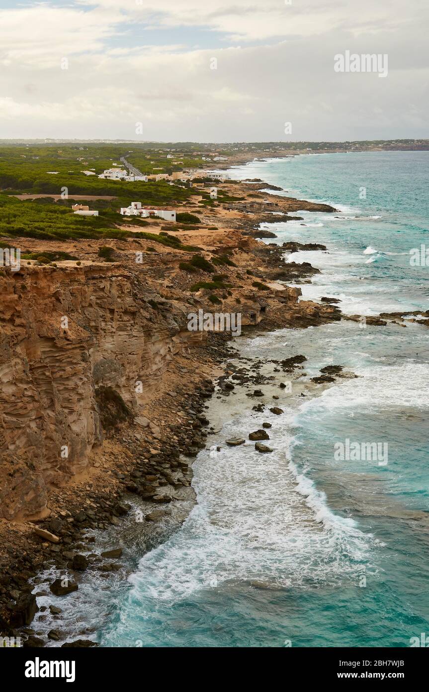 Es Carnatge cliffs and coastline with Es Caló de Sant Agustí in the background (Formentera, Pityuses, Balearic Islands, Mediterranean sea, Spain) Stock Photo