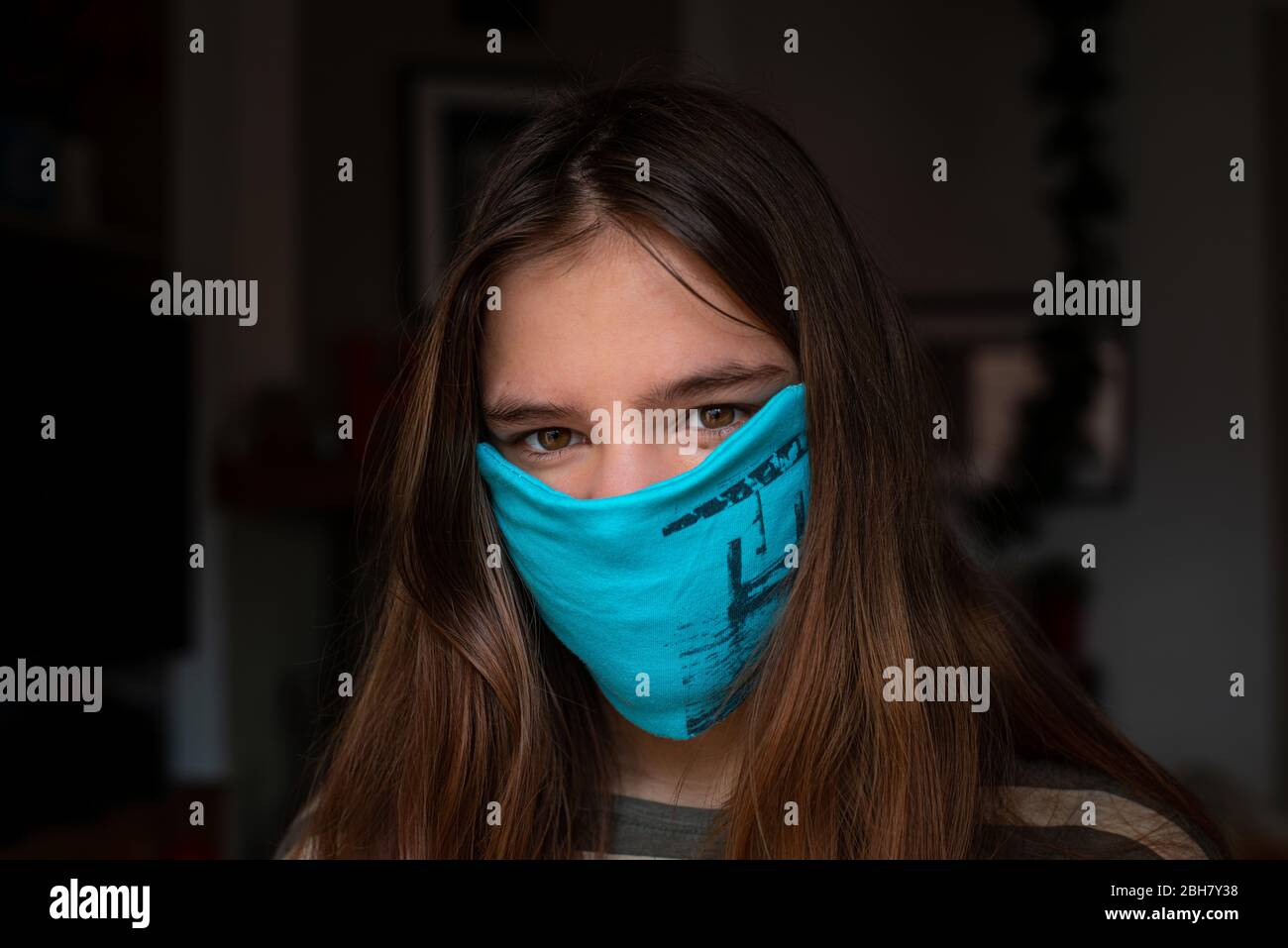 natural Teenage girl wearing home made face mask.,portrait. Stock Photo