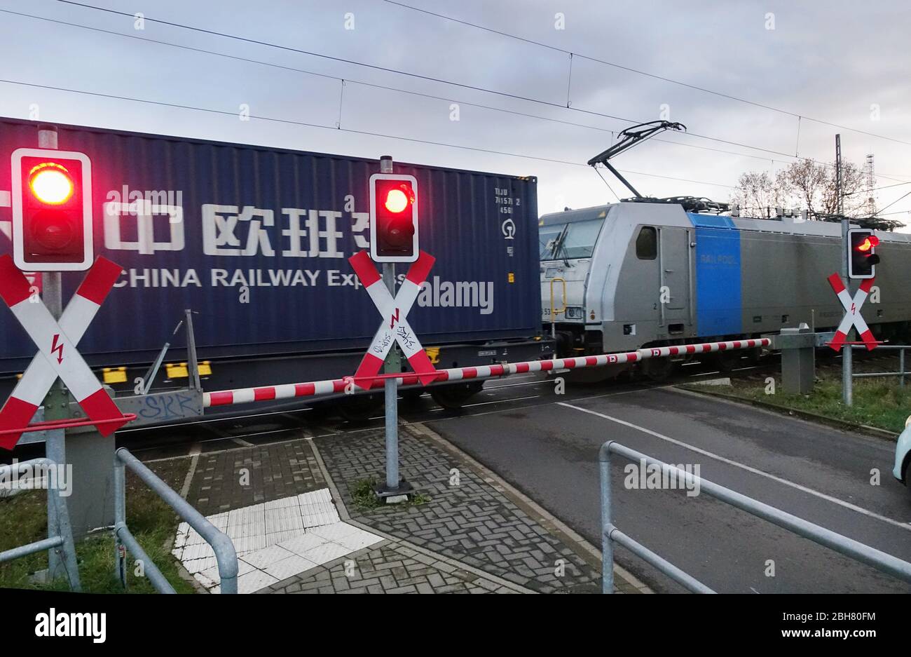 09 11 19 Biederitz Saxony Anhalt Germany Freight Train Of The China Railway Express Passes A Closed Level Crossing 00sd074caroex Jpg Mo Stock Photo Alamy