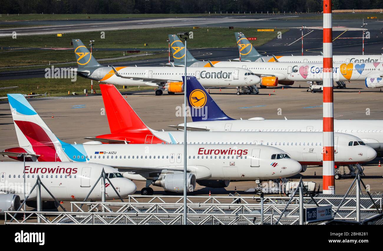 15.04.2020, Duesseldorf, North Rhine-Westphalia, Germany - Duesseldorf airport in times of the corona crisis, many planes of the airlines Condor and E Stock Photo