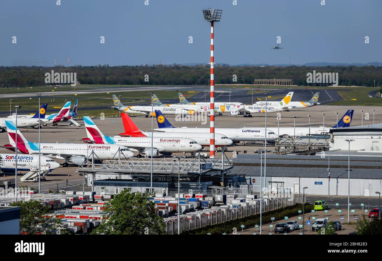 15.04.2020, Duesseldorf, North Rhine-Westphalia, Germany - Duesseldorf airport in times of the corona crisis, many airplanes of the airlines Condor, E Stock Photo