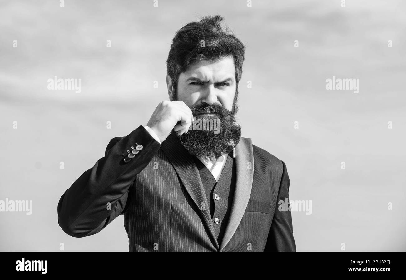 Vintage style beard. Facial hair beard and mustache care. Beard fashion  trend. Start with grooming routine and ultimately lead better world. Man  bearded hipster wear formal suit blue sky background Stock Photo -