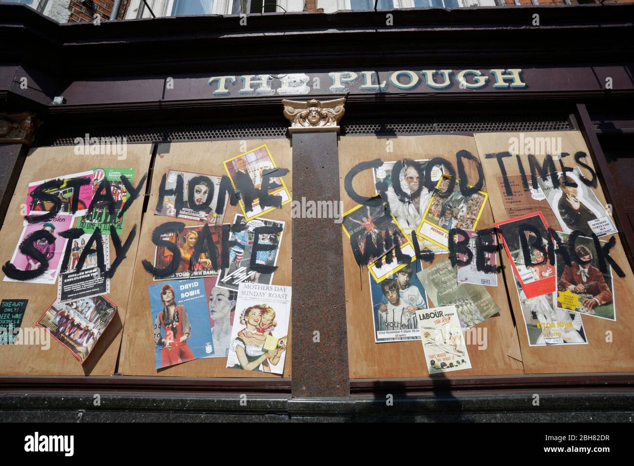 Homerton, London, UK. 24th Apr 2020. The boarded up Homerton pub in East London, calling people to stay home and safe. Due to the Covid-19 outbreak. Credit: Marcin Nowak/Alamy Live News Stock Photo