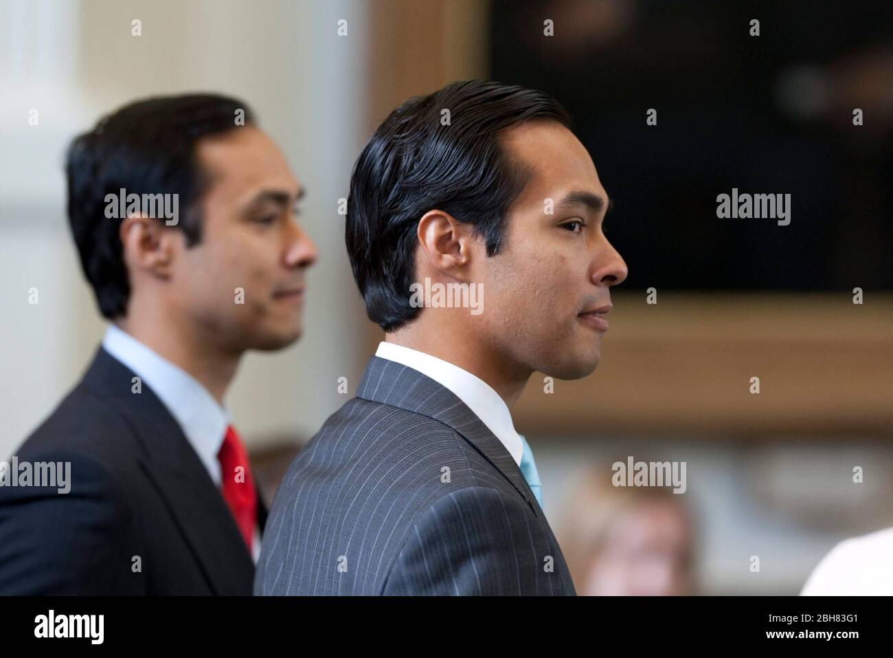 Austin Texas USA, May 27, 2009: Newly-elected mayor of San Antonio, Julian Castro, visits with legislators at the Texas Capitol following his spring election victory. Castro's identical twin brother, Joaquin (left), is a state representative. ©Bob Daemmrich Stock Photo