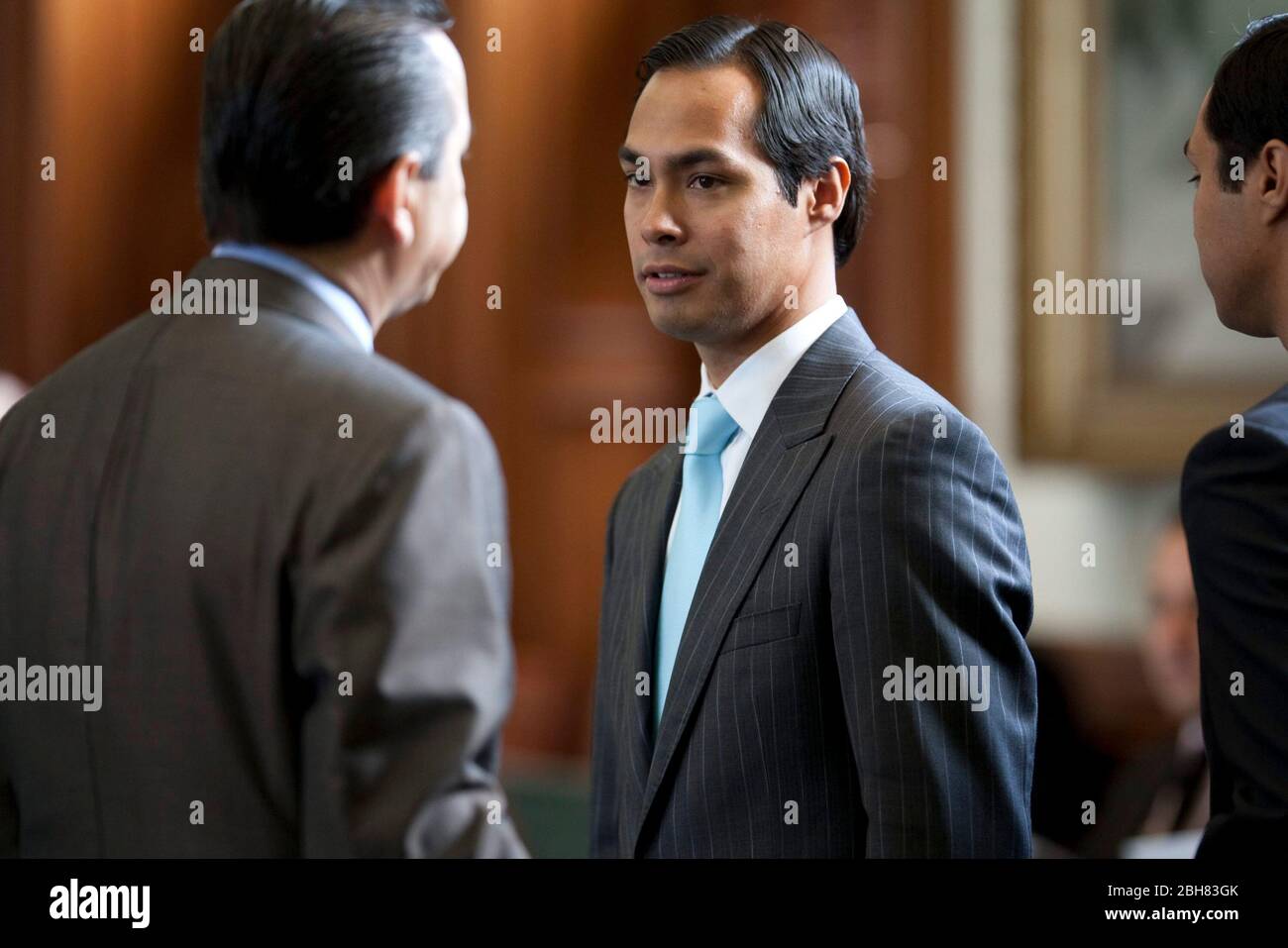 Austin Texas USA, May 27, 2009: Newly-elected mayor of San Antonio, Julian Castro, visits with legislators at the Texas Capitol following his spring election victory. Castro's identical twin brother, Joaquin (right), is a state representative from San Antonio. ©Bob Daemmrich Stock Photo