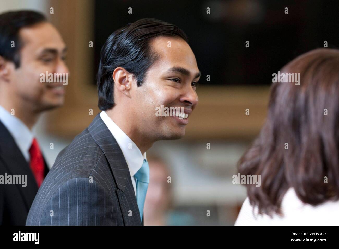 Austin Texas USA, May 27, 2009: Newly-elected mayor of San Antonio, Julian Castro, visits with legislators at the Texas Capitol following his spring election victory. Castro's identical twin brother, Joaquin (left), is a state representative from San Antonio. ©Bob Daemmrich Stock Photo