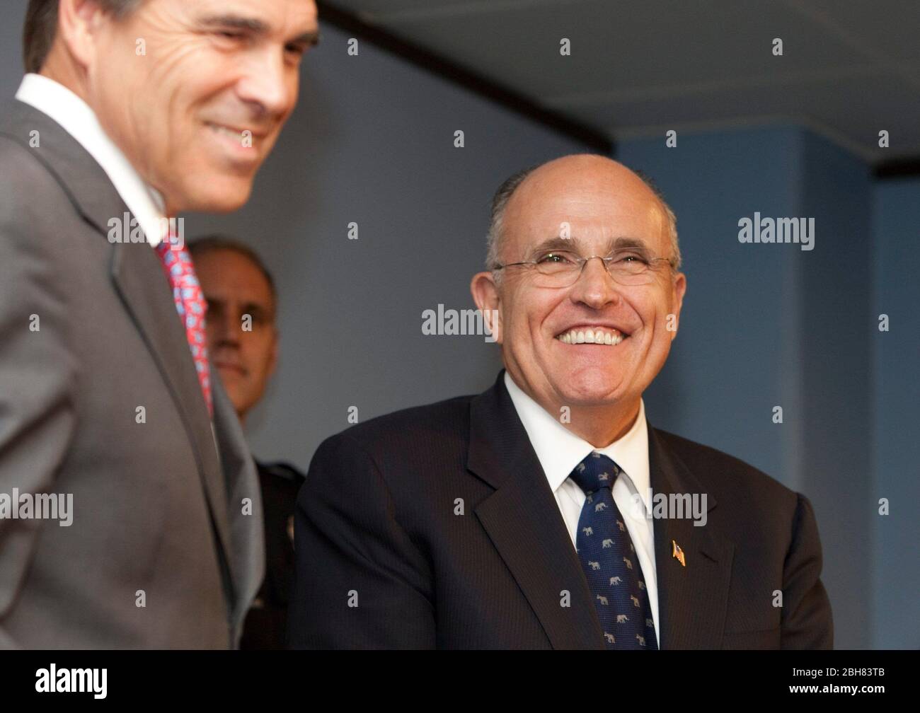 Austin Texas USA, September 15, 2009: Former New York City Mayor Rudy Giuliani (r) joins Texas Gov. Rick Perry at a press conference denouncing what they say is federal government inaction on border immigration issues that affect Texas as well as the rest of the United States. Perry and Giuliani are touring the state in a series of political fund-raisers. ©Bob Daemmrich Stock Photo