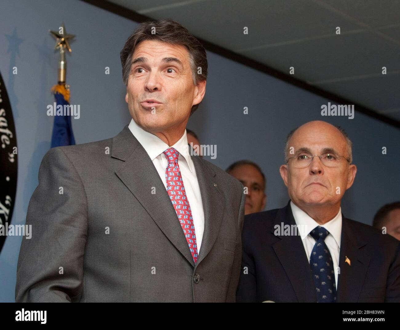 Austin Texas USA, September 15, 2009: Former New York City Mayor Rudy Giuliani (r) joins Texas Gov. Rick Perry at a press conference denouncing what they say is federal government inaction on border immigration issues that affect Texas as well as the rest of the United States. Perry and Giuliani are touring the state in a series of political fund-raisers. ©Bob Daemmrich Stock Photo
