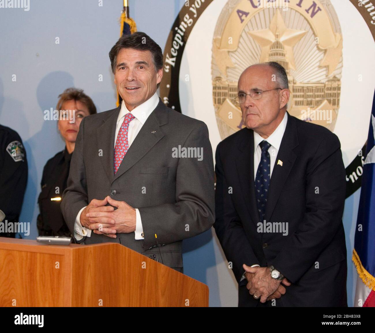 Austin Texas USA, September 15, 2009: Former New York City Mayor Rudy Giuliani (r) joins Texas Gov. Rick Perry at a press conference denouncing what they say is federal government inaction on border immigration issues that affect Texas as well as the rest of the United States. Perry and Giuliani are touring the state in a series of political fund-raisers. ©Bob Daemmrich Stock Photo