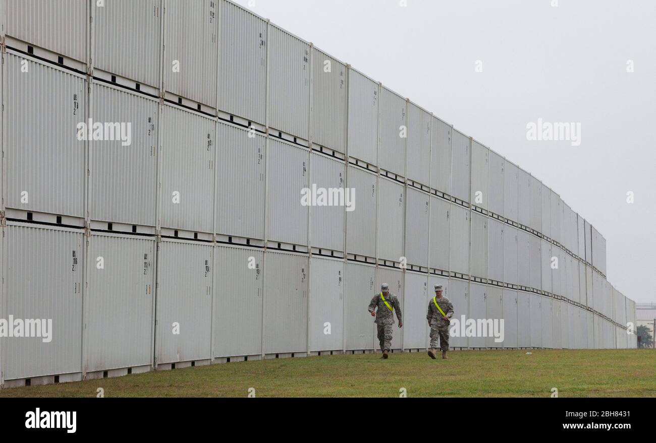 Fort Hood, Texas USA, November 9, 2009: Steel shipping containers are stacked 26 feet high as a security perimeter around III Corps headquarters where President Obama will speak to the military community grieving after last week's shooting at the Army post that claimed 13 lives. ©Bob Daemmrich Stock Photo