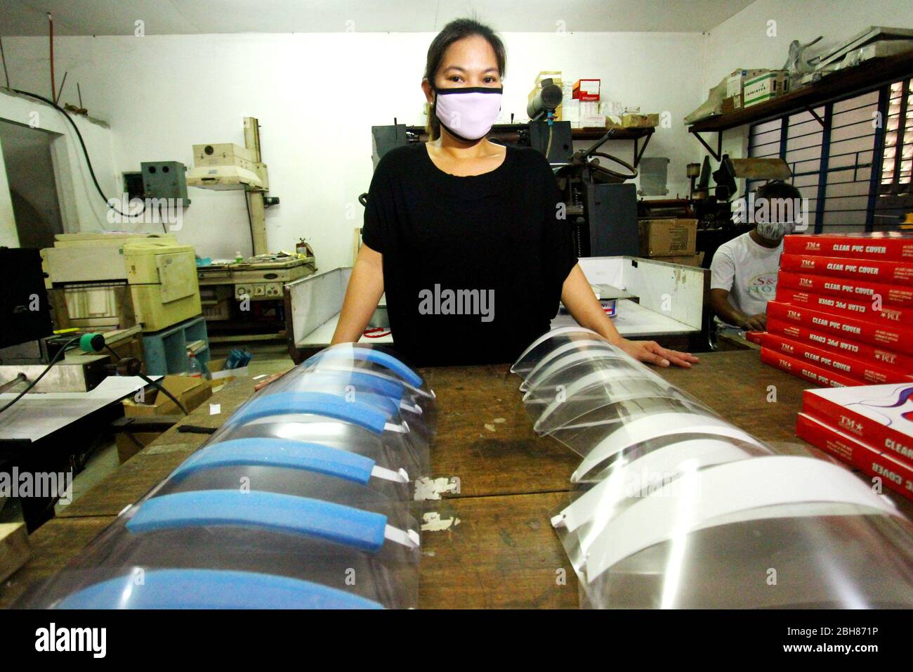 Philippines. 23rd Apr, 2020. Tina Nina Sta Ana show the two types of face shield that they are produce in 18 Sitio Ilog Pugad, Brgy. San Juan, Taytay, Rizal on April 23, 2020. Sta. Ana twin sisters of Taytay province of Rizal, Tracy Z. Sta Ana and Tina Nina Z. Sta Ana produces PPE for the frontliners who fight for the Covid-19 pandemic that shock the humanity. (Photo by Gregorio B. Dantes Jr./Pacific Press/Sipa USA) Credit: Sipa USA/Alamy Live News Stock Photo