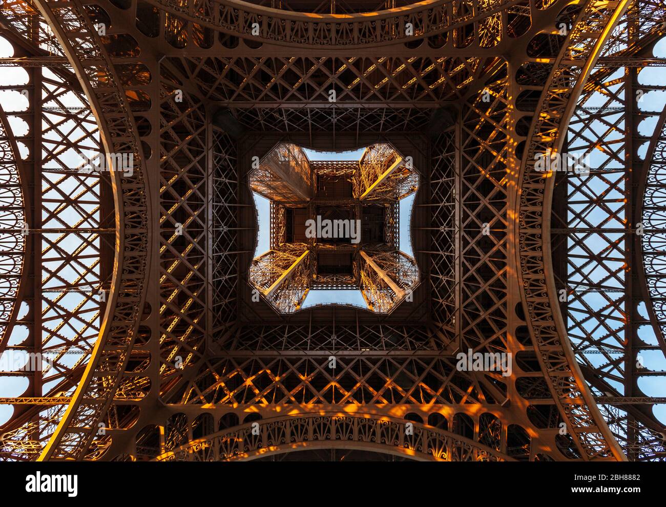 The ironwork structure of the Eiffel Tower from directly below, Paris Stock Photo