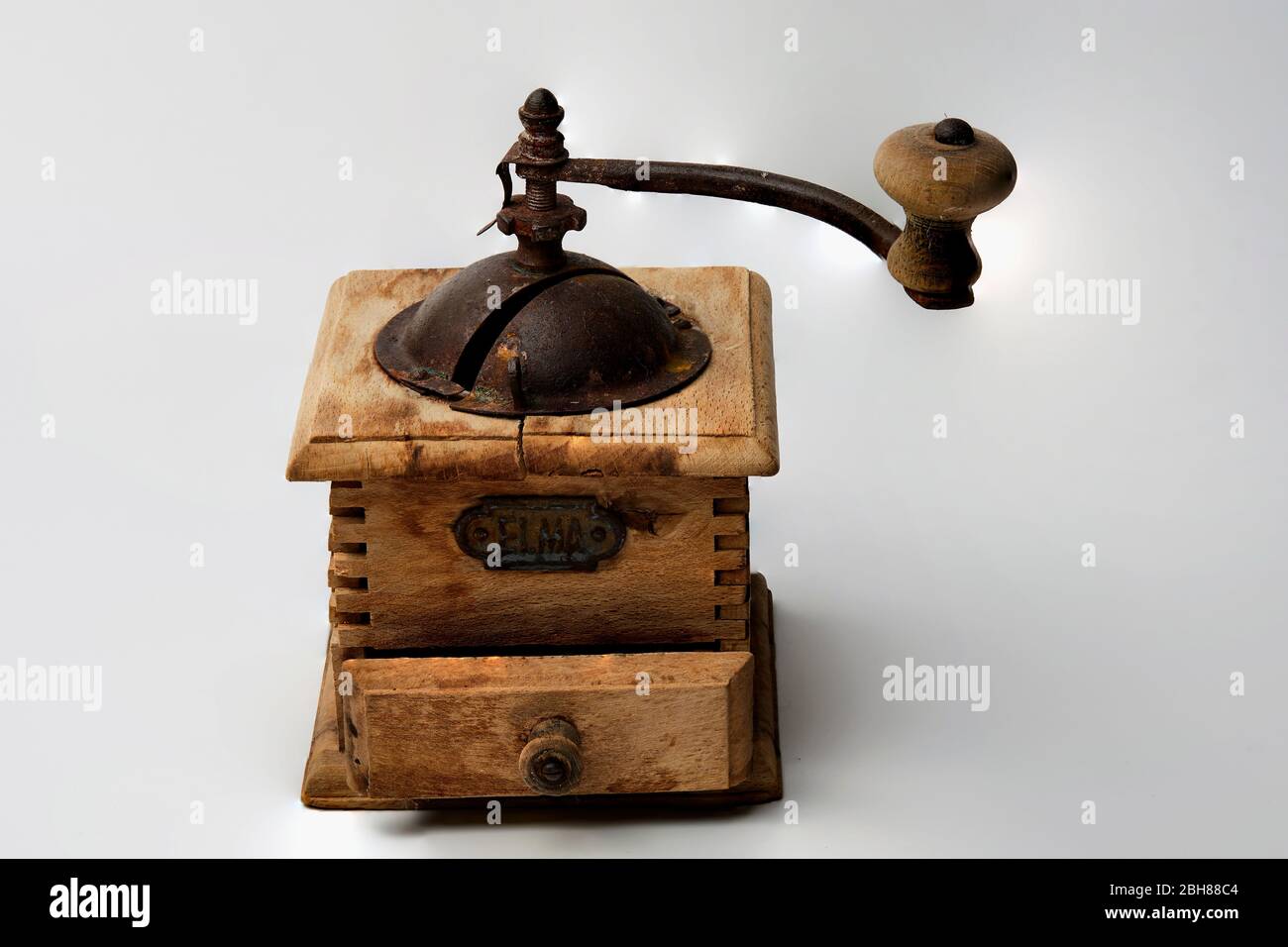 https://c8.alamy.com/comp/2BH88C4/beautiful-still-life-old-wooden-coffee-grinder-on-white-background-2BH88C4.jpg