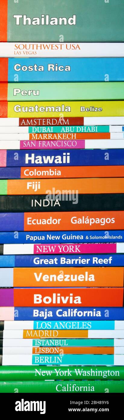 Travel books in vertical composition Stock Photo