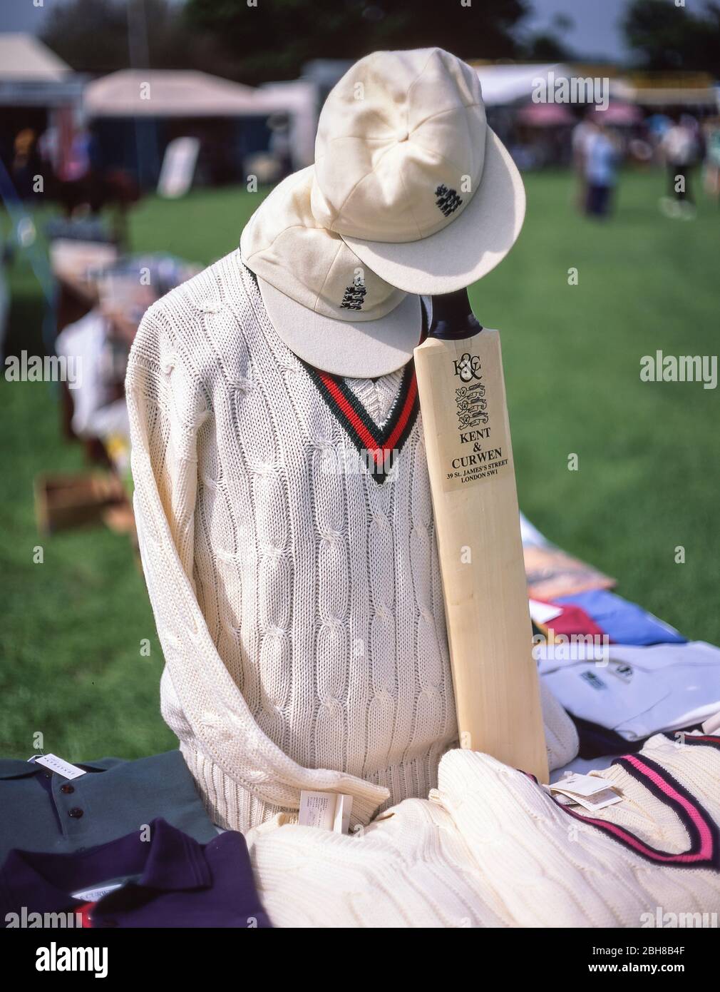 Cricket jumper, bat and cap on stall at The Royal Windsor Horse Show,  Windsor, Berkshire, England, United Kingdom Stock Photo - Alamy