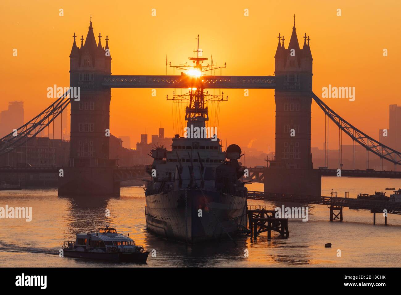 England, London, Tower Bridge and Museum Ship HMS Belfast at Sunrise Stock Photo