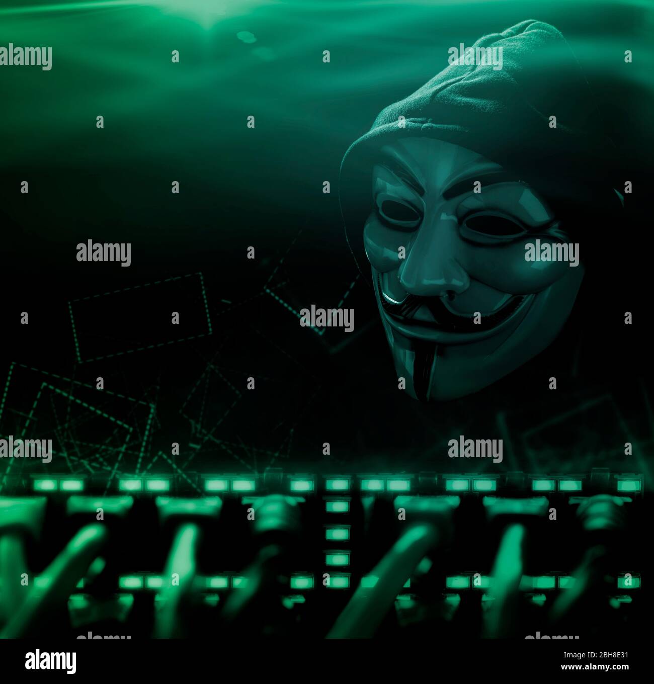 Anonymer Computerhacker mit Maske und Kapuze Stock Photo