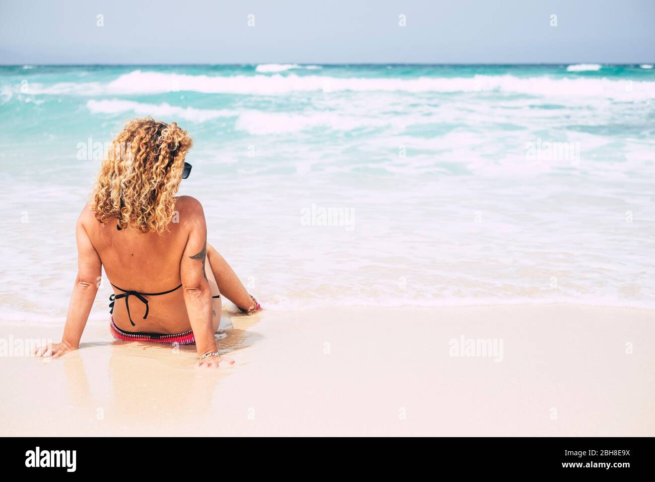 Middle age woman in bikini hi-res stock photography and images