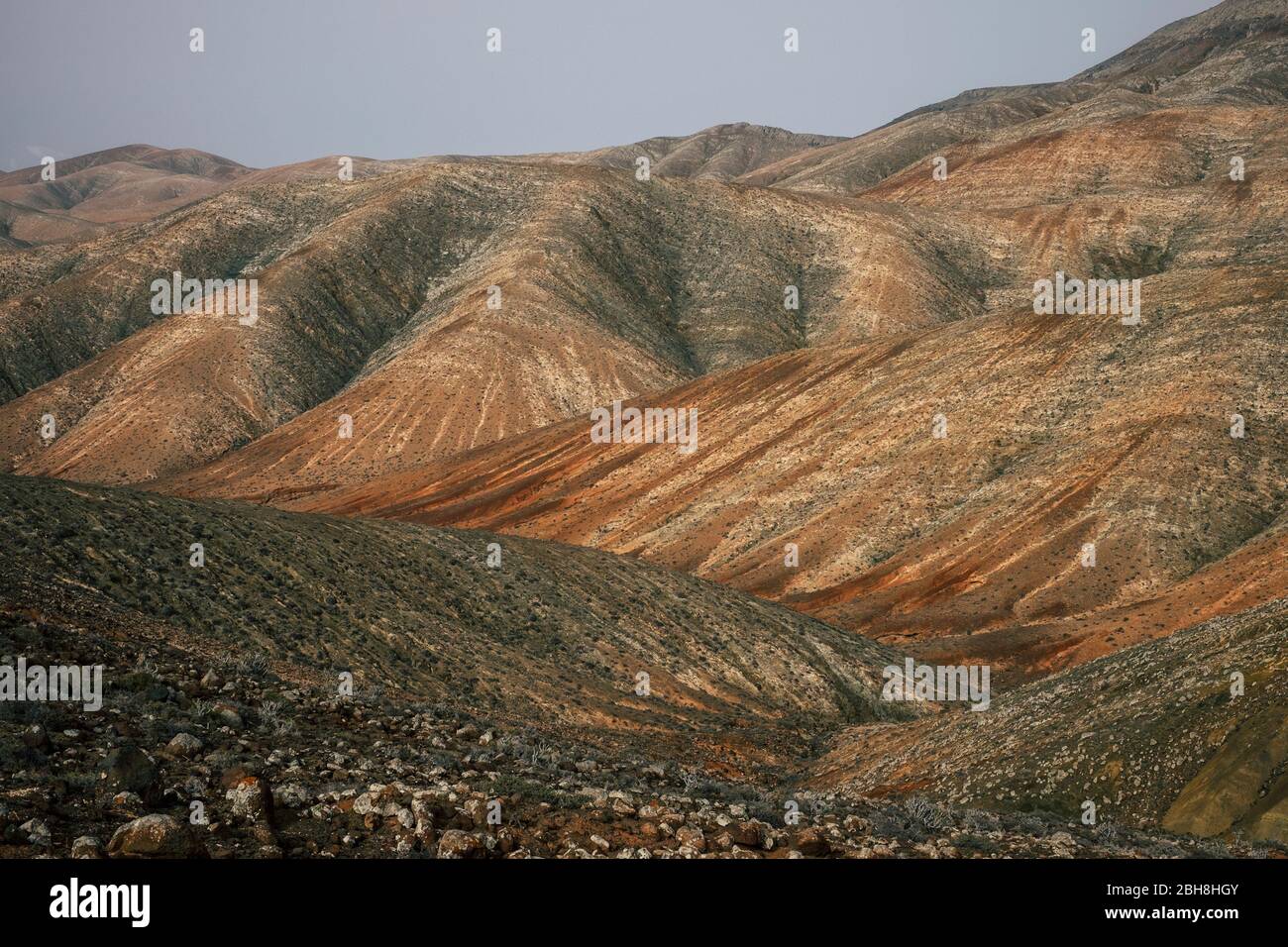 Mountains landscape with vulcans and brown ground - perfect place for trekking and discover new scenic places - africa furteventura desert arid climate change concept Stock Photo