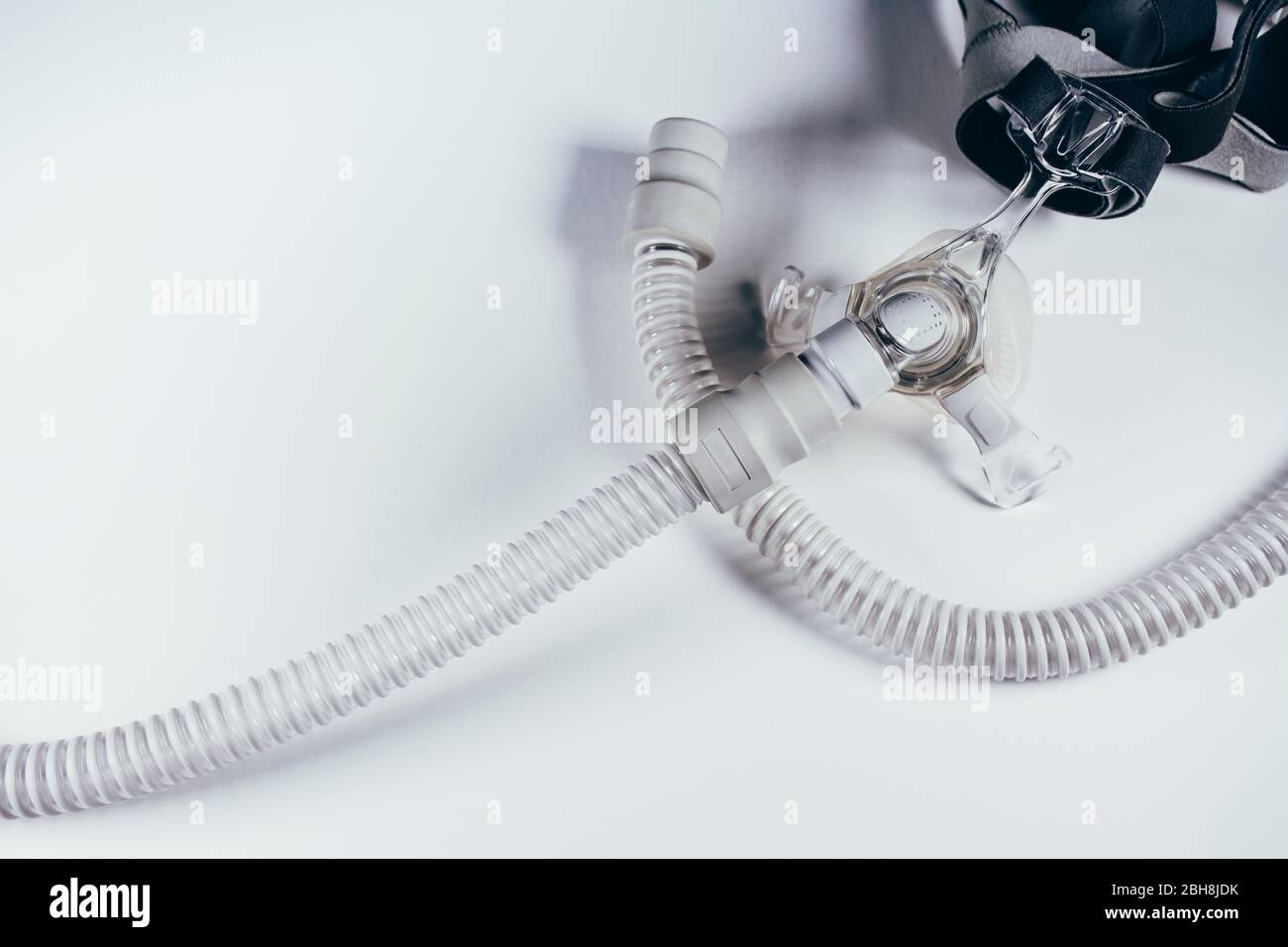 Respiratory mask for sleep disorders isolated over white. Apnea