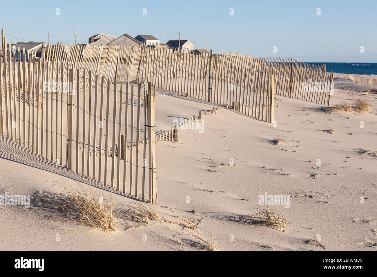USA, New England, Massachusetts, Nantucket Island, Madaket, Madaket Beach, sand fence and shadows Stock Photo