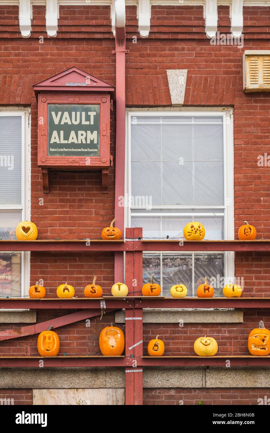 USA, Maine, Eastport, carved Jack-O'Lantern pumpkins for Halloween, autumn Stock Photo
