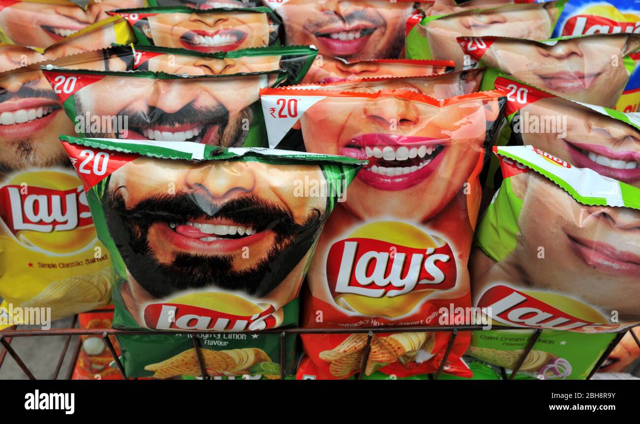 Display of bags of potato chips, crisps, in a shop in india Stock Photo