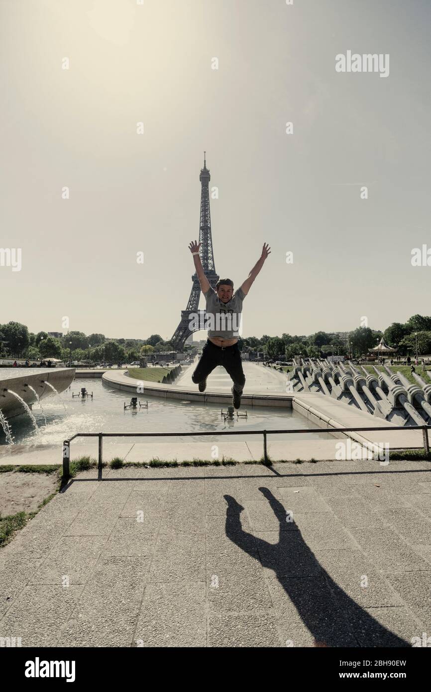 Palais de Chaillot with Eiffel Tower and jumping man Stock Photo