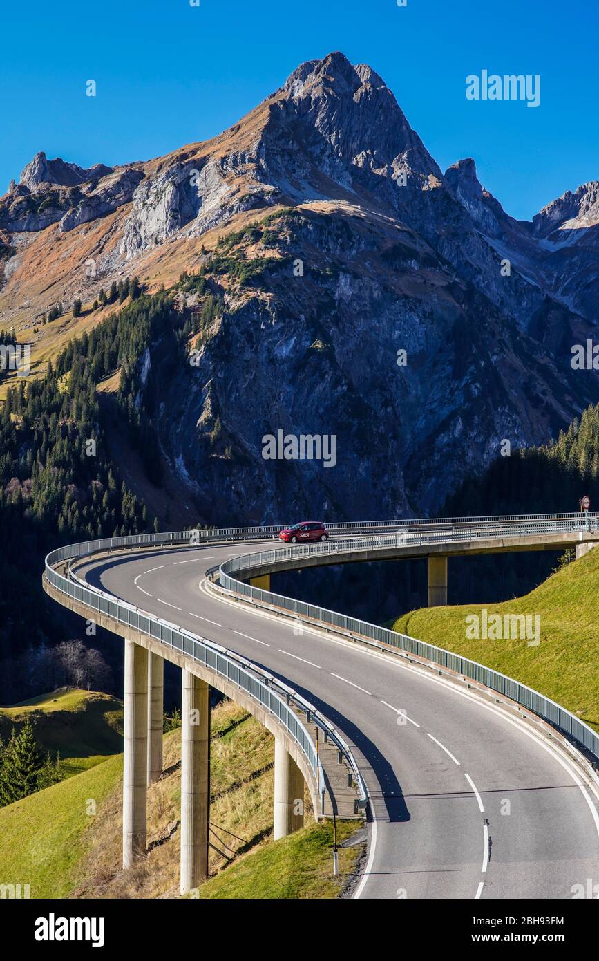 with the E - car on a pass road in the Arlberg region, without CO2 emissions through nature Stock Photo