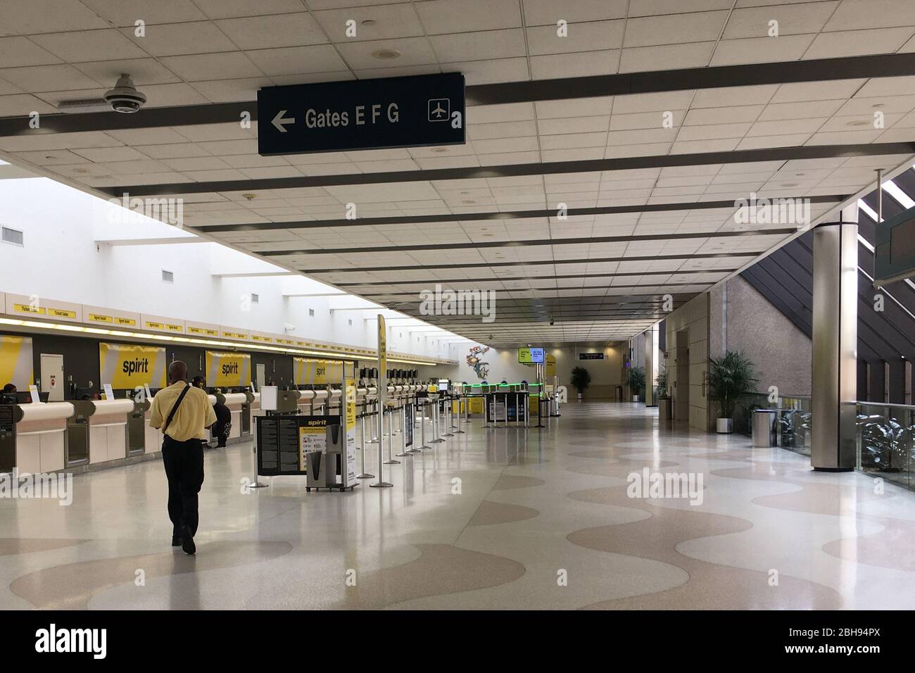 FORT LAUDERDALE, FL - APRIL 24: COVID-19: A desolate scene in the terminals at Fort Lauderdale-Hollywood International Airport as Floridians attempt to slow the spread of the Coronavirus by staying home or using social distancing. Amid the coronavirus pandemic, Broward County Commissioner Mark Bogen has called for the suspension of all direct commercial airline traffic at Fort Lauderdale-Hollywood International Airport from 'hot spots' like New Orleans and New York. The suspension would last until May 1, 2020 on April 24, 2020 in Fort Lauderdale, Florida People: Atmosphere Stock Photo