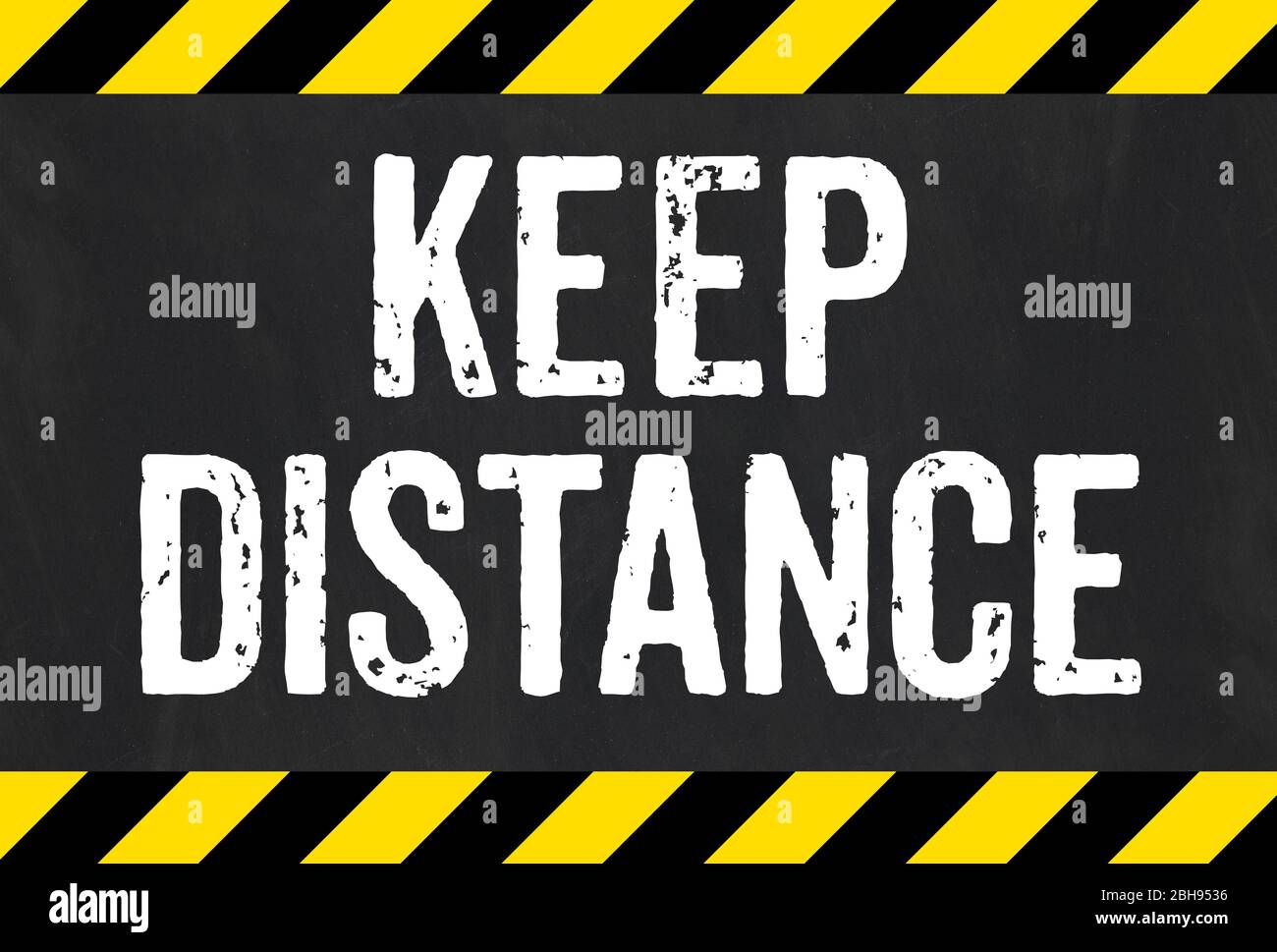 Sign with caution stripes - Keep distance Stock Photo - Alamy