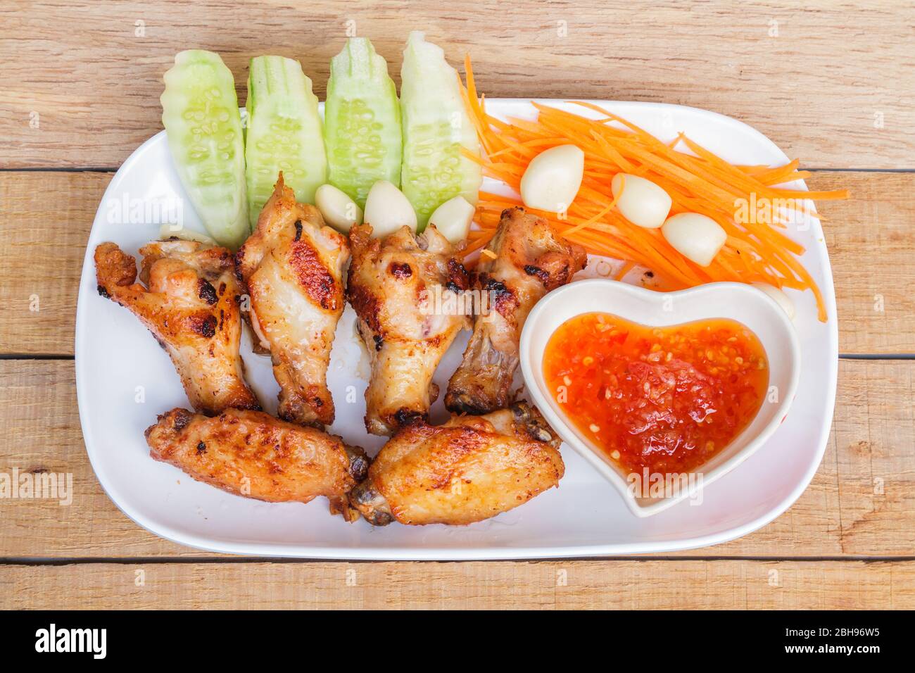 Fried chicken with fish sauce Stock Photo