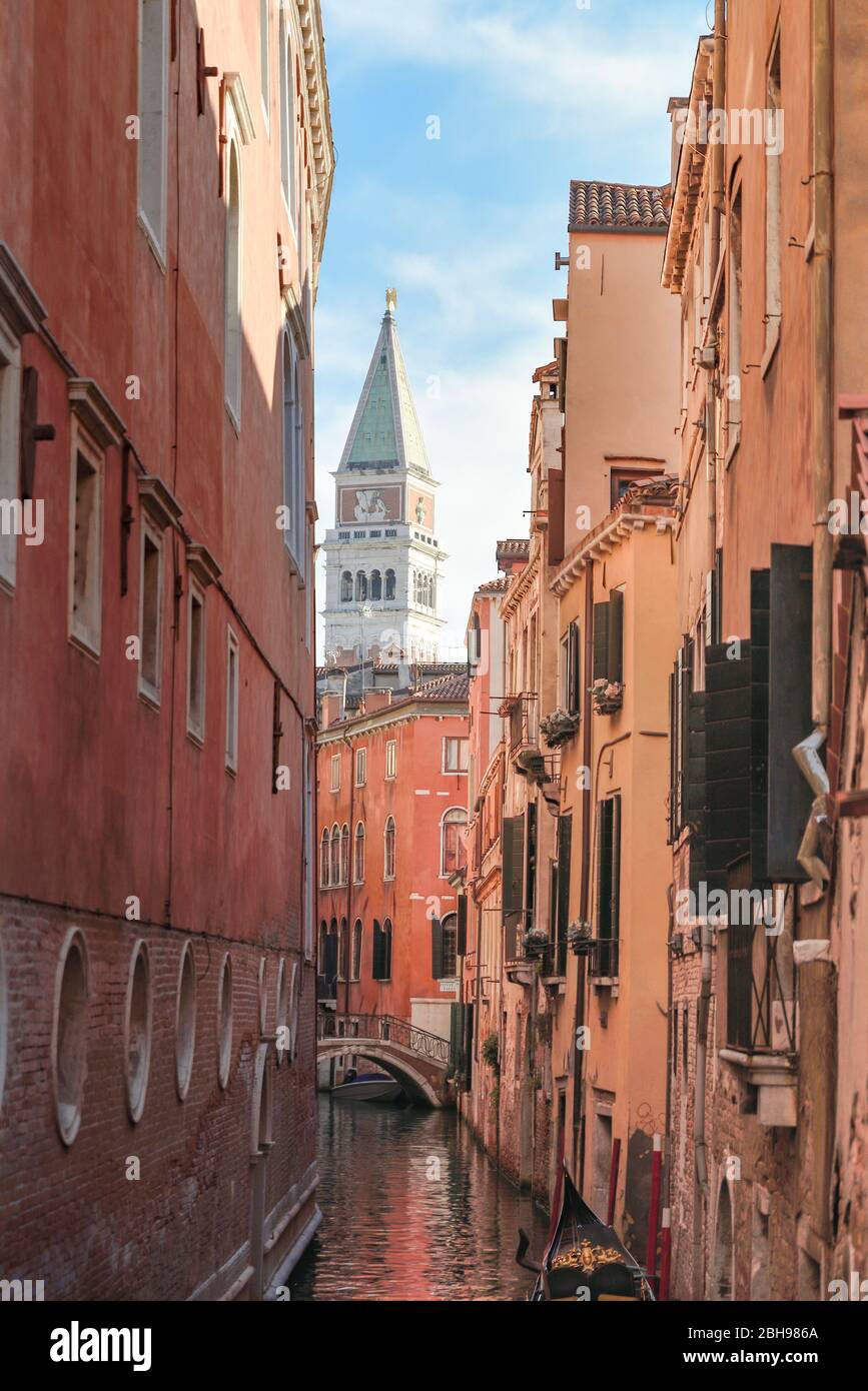 View on the canal landscape of Venice with Markustower in the background Stock Photo