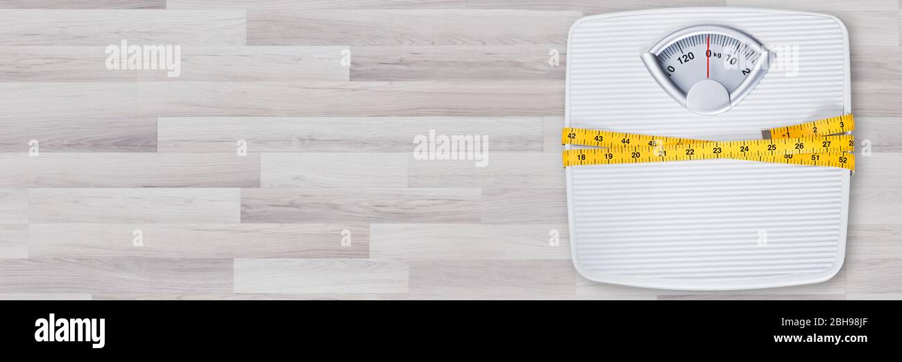 https://c8.alamy.com/comp/2BH98JF/weightloss-weight-scale-in-bathroom-scales-kilograms-balance-2BH98JF.jpg
