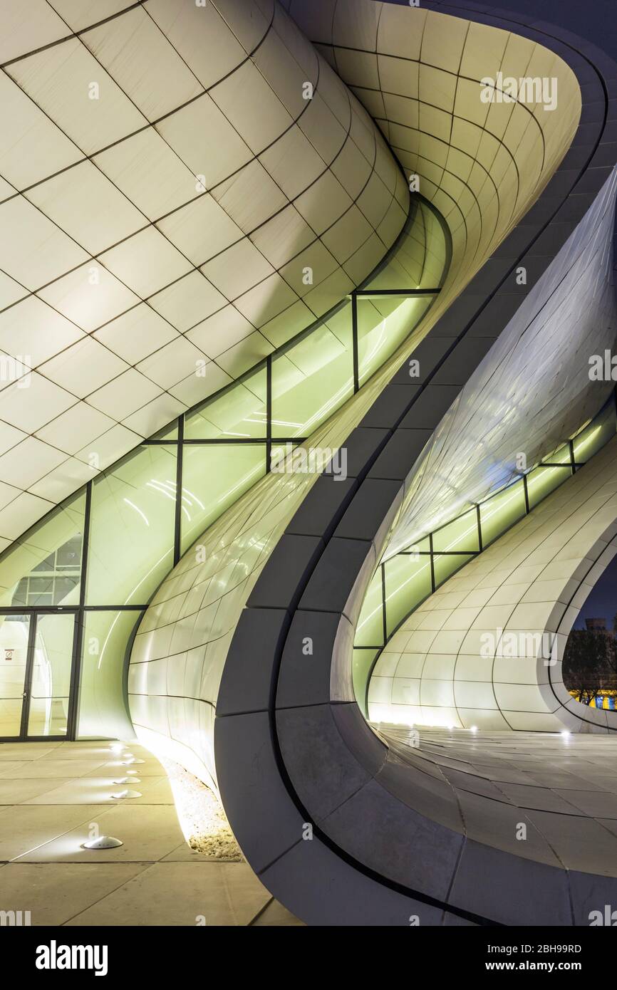 Azerbaijan, Baku, Heydar Aliyev Cultural Center, building designed by Zaha Hadid, exterior, dusk Stock Photo