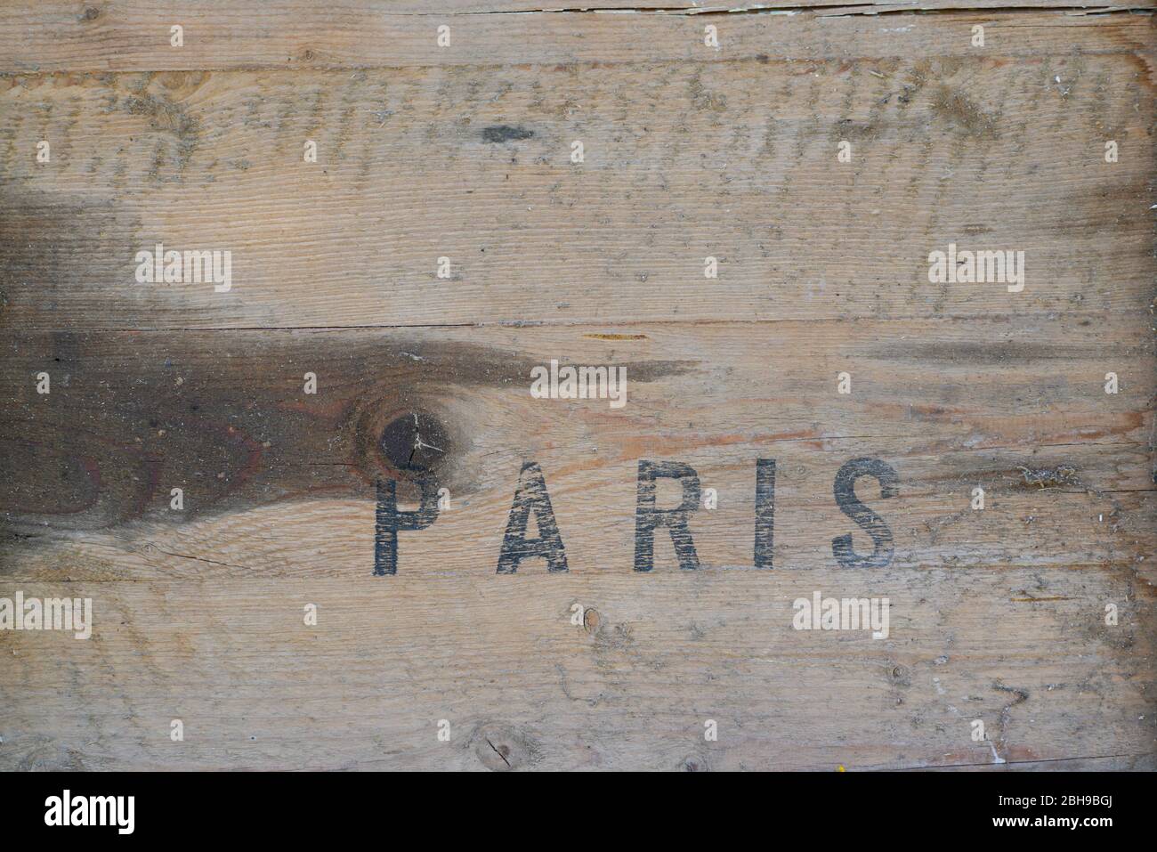 Paris stamp paint word letters on wood transport box vintage wooden background Stock Photo