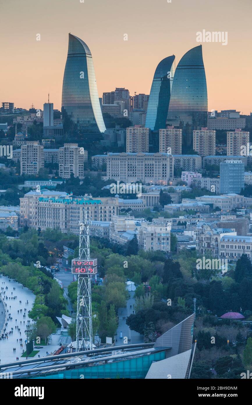 Azerbaijan, Baku, high angle city skyline, from the north, dusk Stock Photo