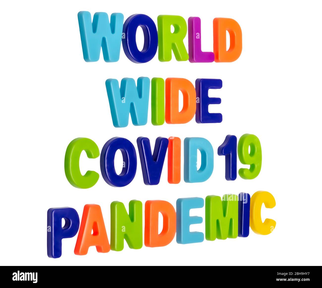 Coronavirus pandemic, text WORLD WIDE COVID-19 PANDEMIC on a white background. Worldwide pandemic. COVID-19 is the official new name for coronavirus d Stock Photo