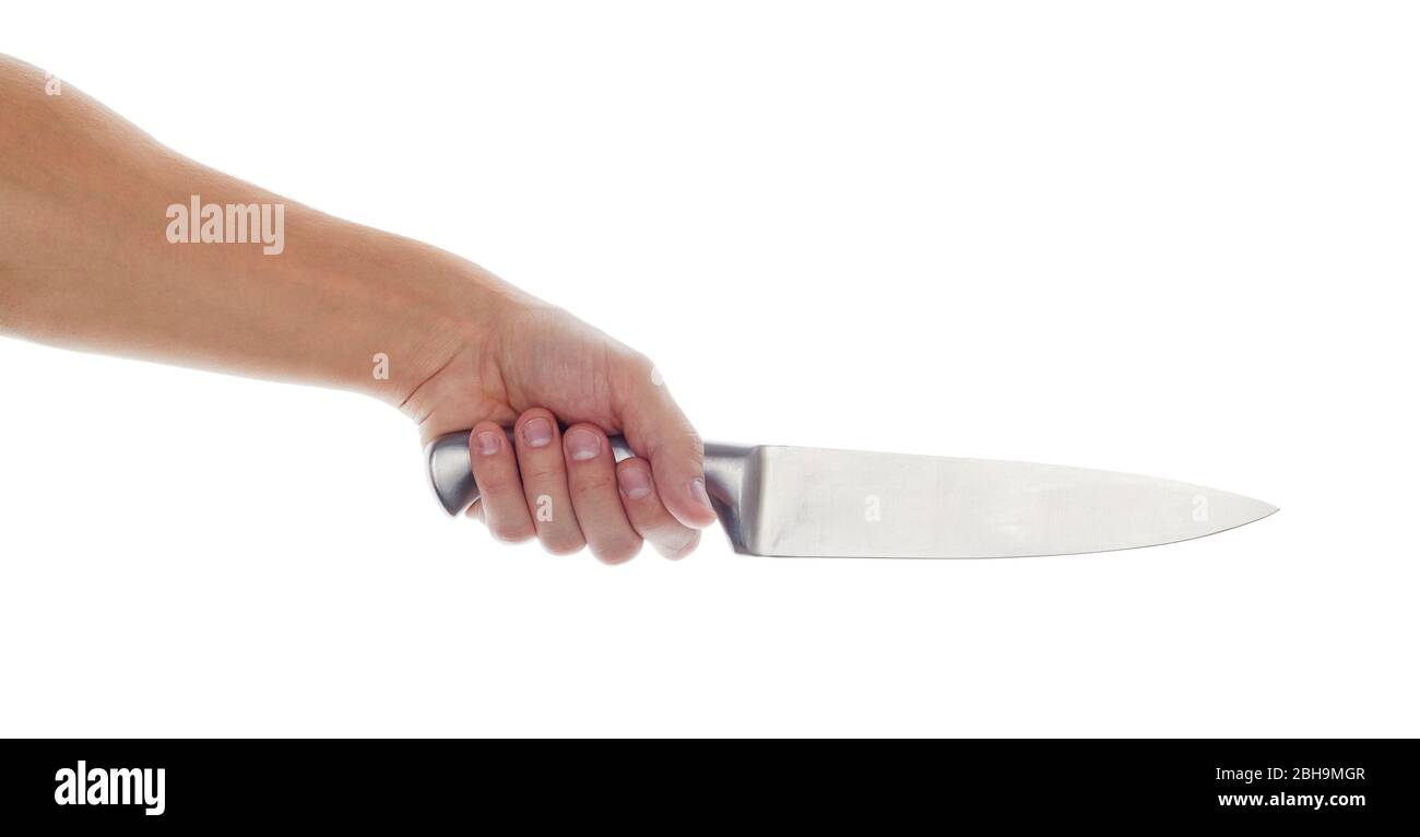 Male hand holding big silver kitchen knife Stock Photo