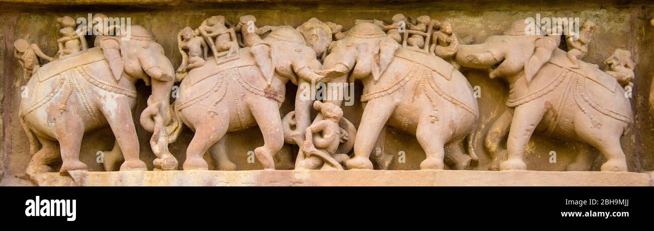 Arts on wall, Khajuraho temples, India Stock Photo