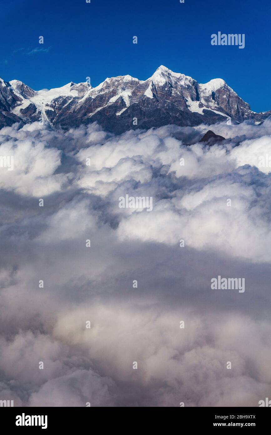 View of the himalayas with clouds hi-res stock photography and images ...