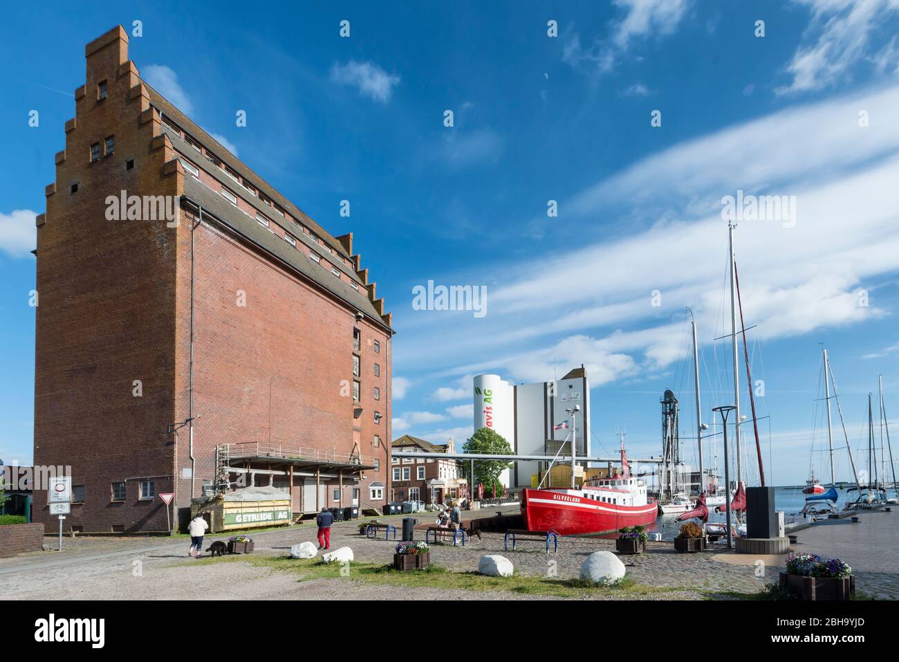 Burgstaaken, Fehmarn, Schleswig-Holstein, Germany, fishing boats and granaries in the fishing port Stock Photo