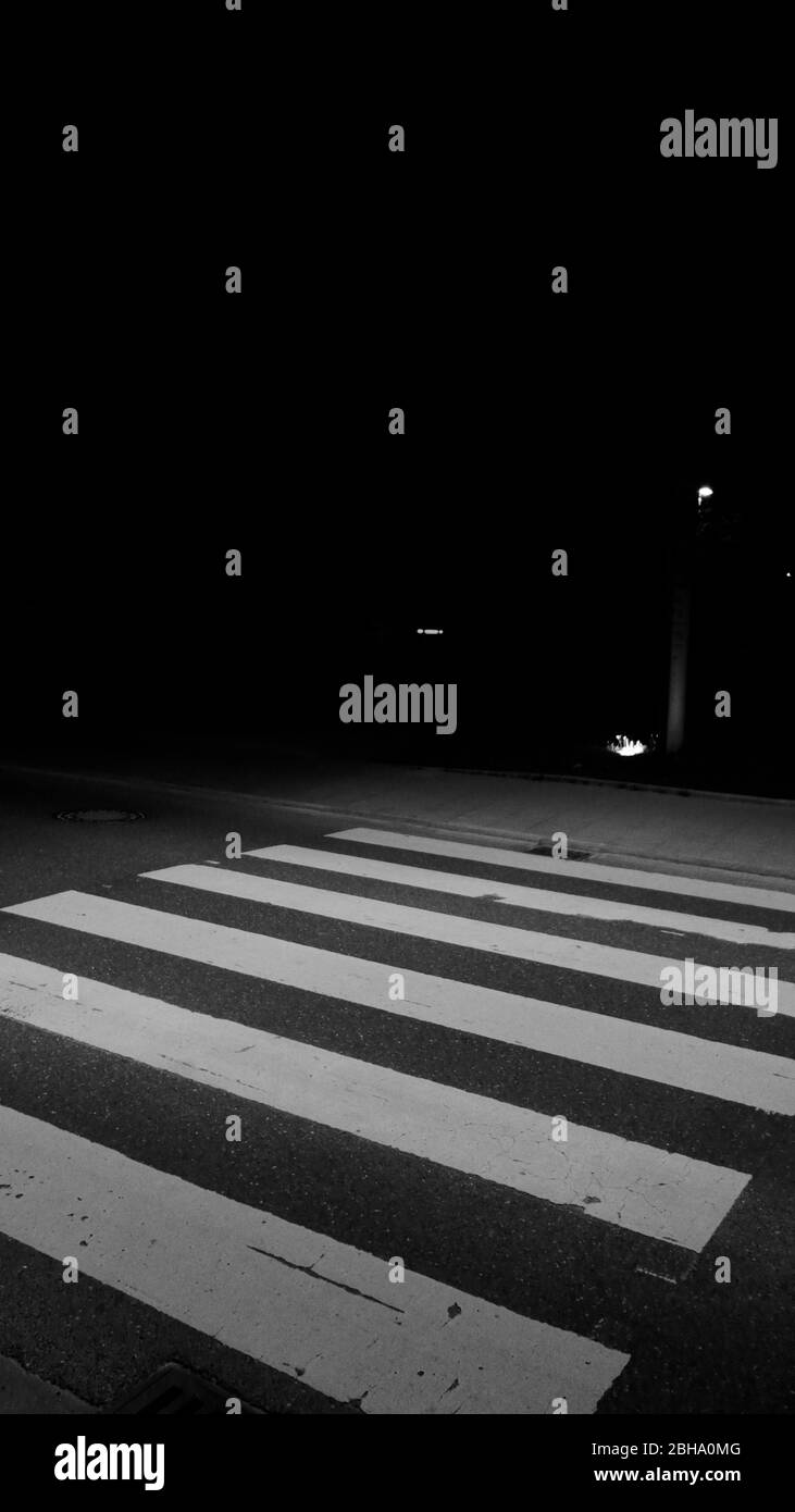 Zebra crossing at night Stock Photo - Alamy