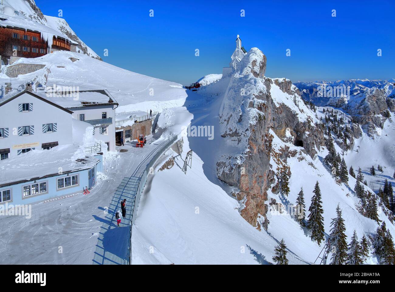 Viewing terrace with mountain house and chapel on the mount Wendelstein in winter, Leitzach valley, Bayrischzell, Mangfall mountains, Upper Bavaria, Bavaria, Germany Stock Photo