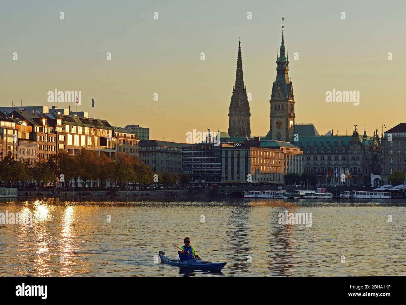 Europe, Germany, Hamburg, City, Binnenalster (Inner Alster lake), towers of the city, paddle boat, evening light, Stock Photo