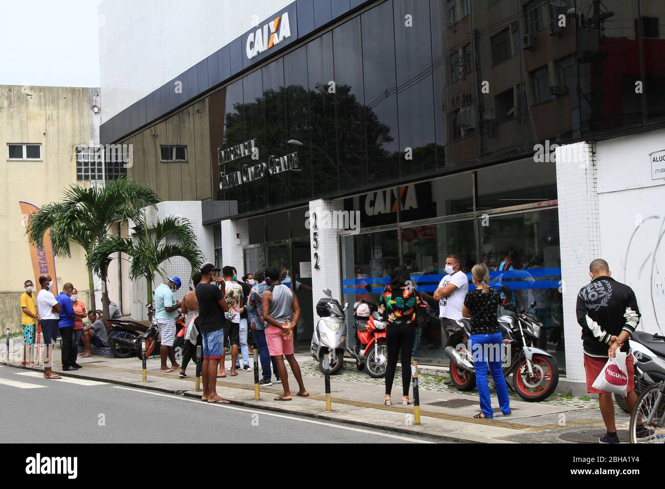 Salvador, Brazil. 24th Apr, 2020. Effects of the pandemic by COVID 19 in  Salvador, (BA). In the photo, line to enter the bank branch Caixa Econômica  Federal, at Rua João das Botas,