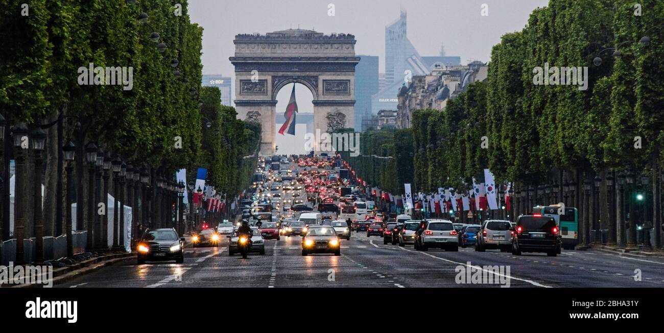 Heavy traffic in front of Arc de Triomphe, Champs-Elysees, Paris, France Stock Photo